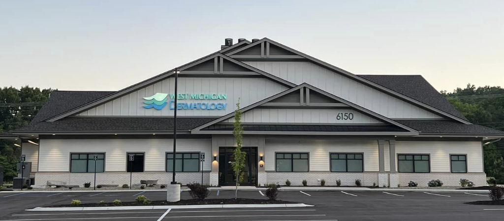 A modern single-story building with signage "West Michigan Dermatology" in Rockford, MI.